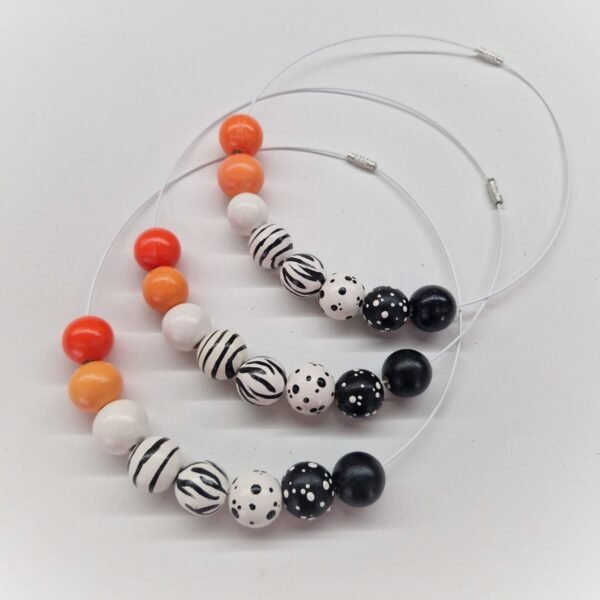 „Dots Stripes Pearls Orange “