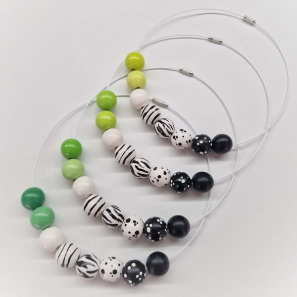 „Dots Stripes Pearls Green“